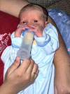 Just a few days old and I'm already holding my bottle